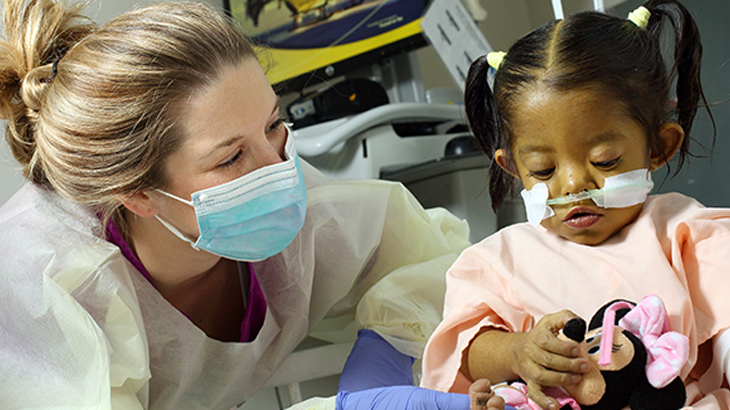 MedStar Georgetown provider with a pediatric critical care unit patient.